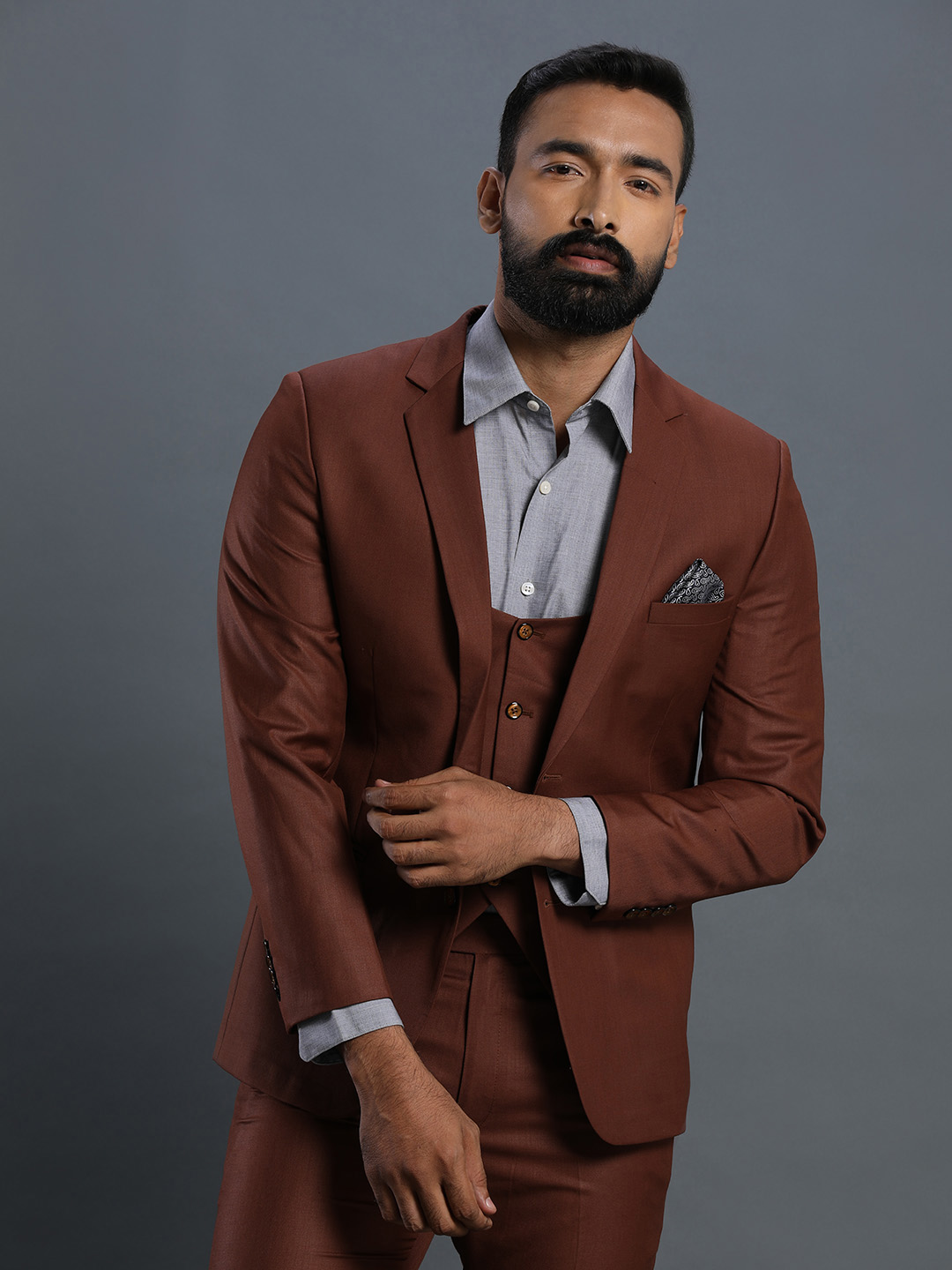 displaying image of Brown 3 Piece Suit