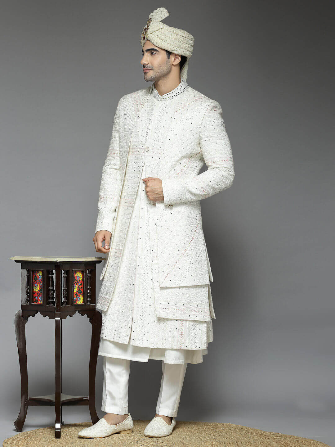 displaying image of Cream Embroidered Designer Flow Sherwani