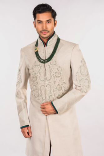 displaying image of HAND-WOVEN EMBROIDERED CREAM ETHNIC SHERWANI