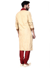 displaying image of cream sherwani set