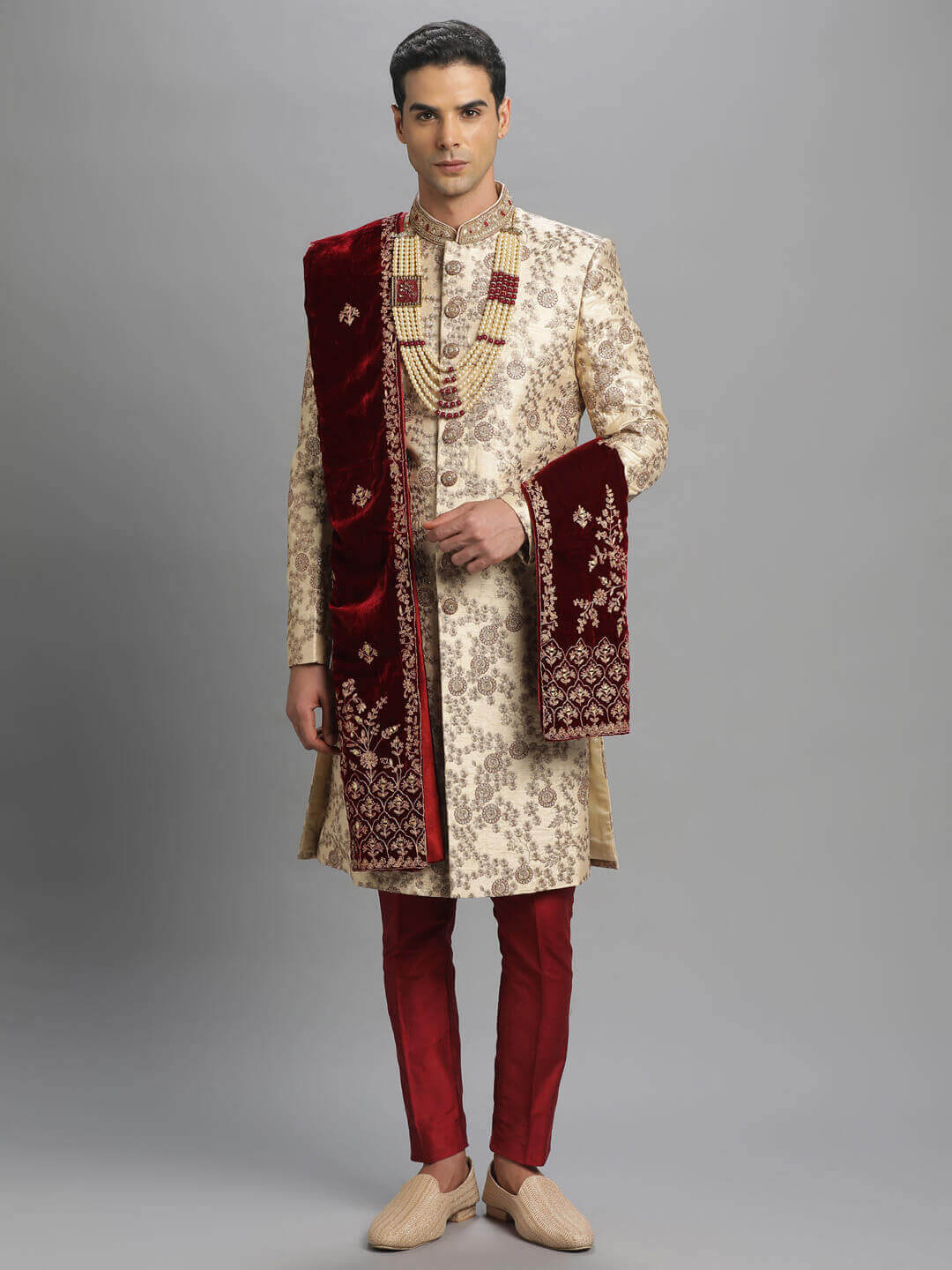 displaying image of Cream Velvet Red Floral Embroidered Sherwani