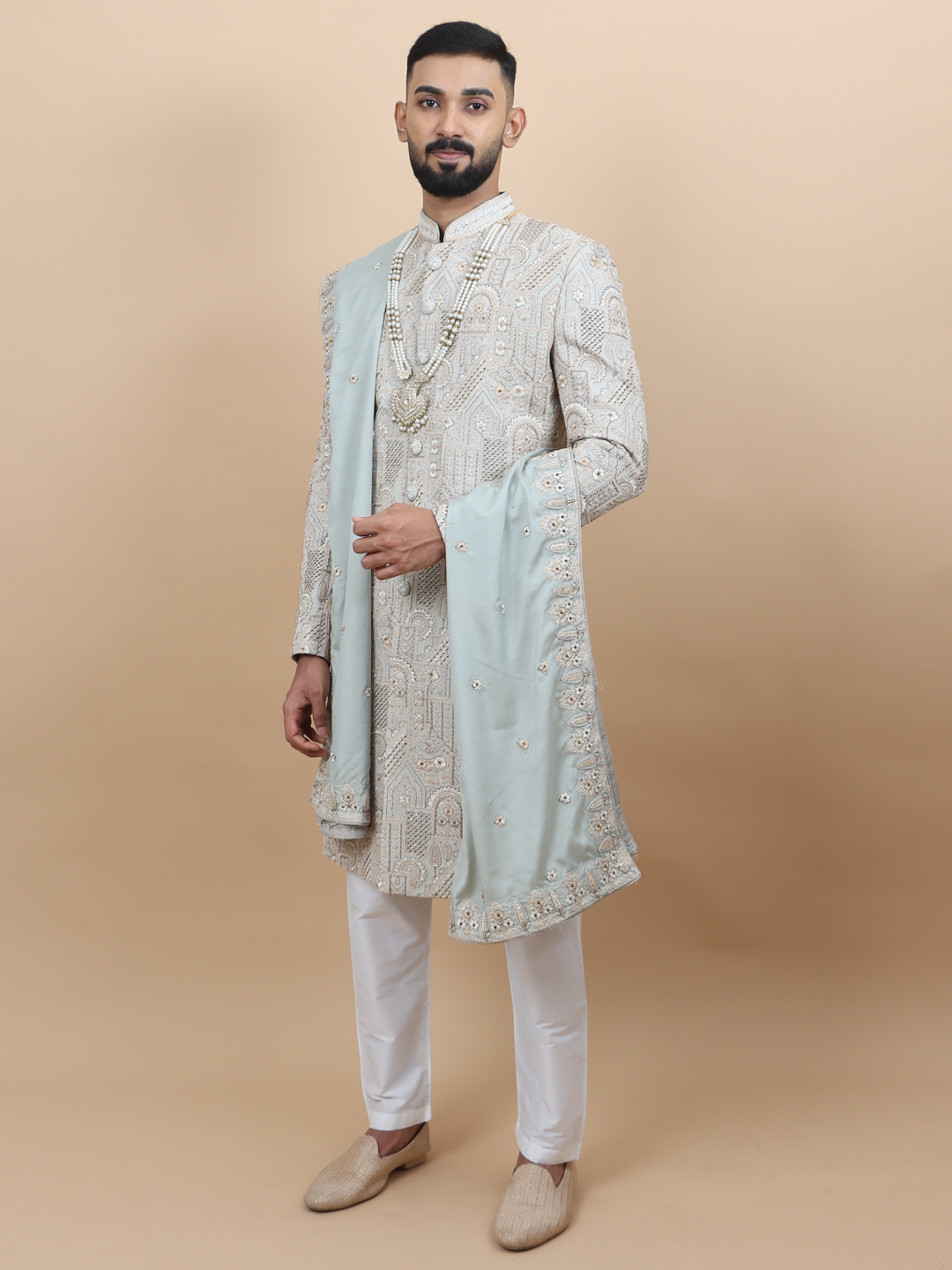 displaying image of Green Heavy Embroidered Groom Sherwani