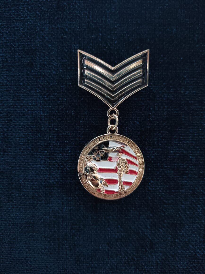 medal-brooch