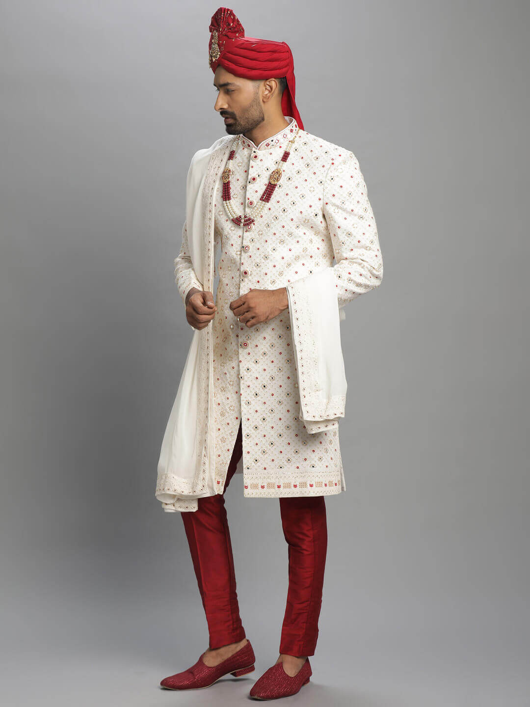 displaying image of White Mirror Red Sherwani