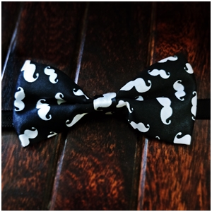 displaying image of White Mustache Black Bow Tie